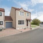 1 front of property showing garage.jpg